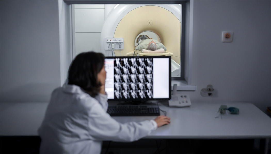 doctor looking ct scan copy